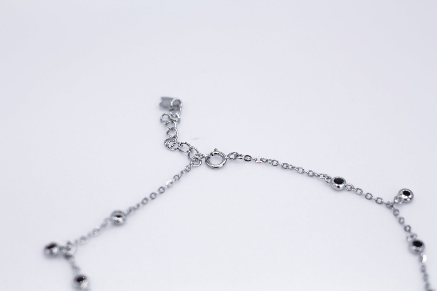 Anklet with black stones